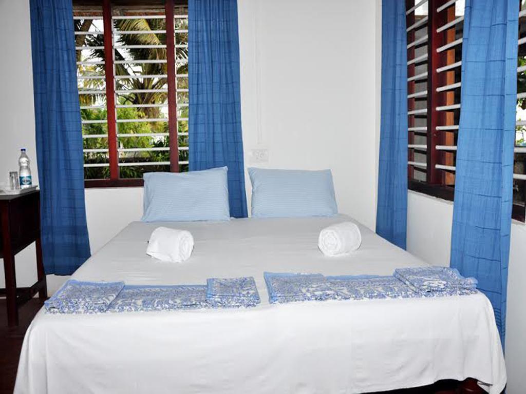 Angeo Beach House Alappuzha Zimmer foto
